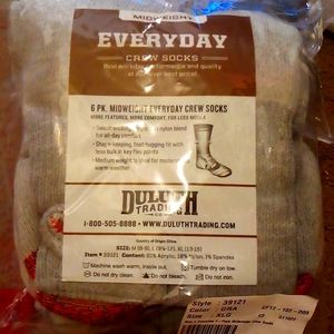 Duluth trading socks six packs one pack is gray the other pack is black